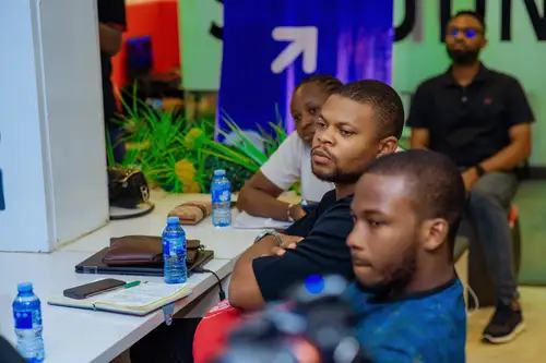 digiTrybe members listening closely during a marketing discussion session